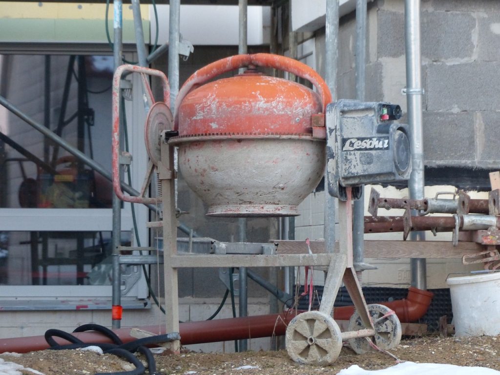 Piece of heavy-duty equipment used to mix concrete.